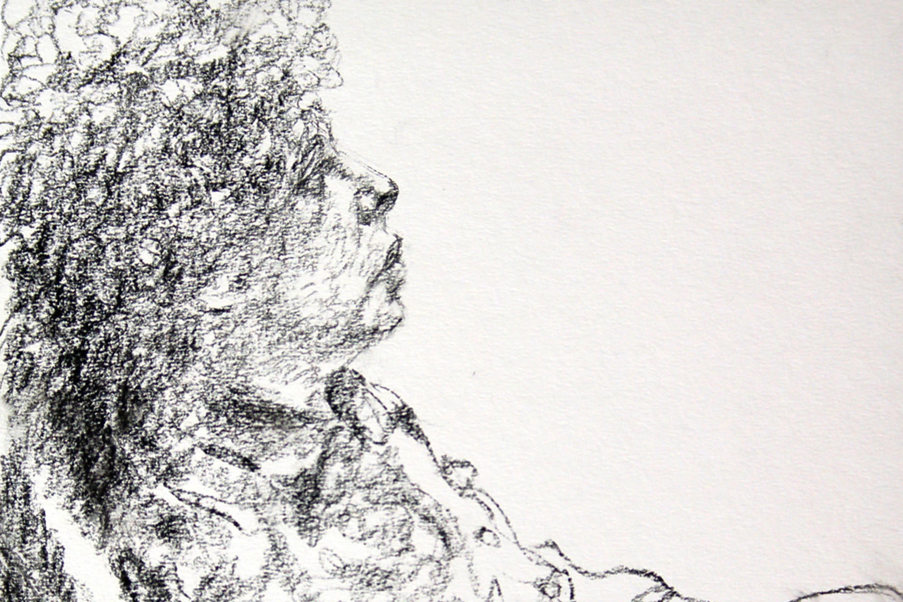 Charcoal sketch of a person with curly hair sitting in profile, gazing upwards.